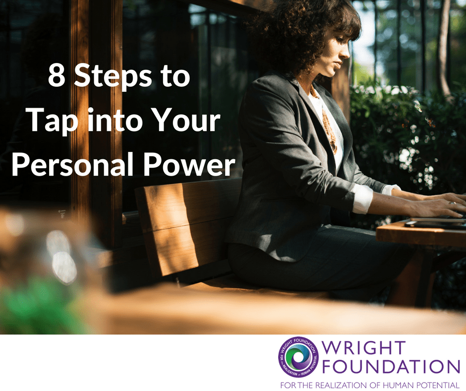 A woman works on her laptop: 8 steps to tap into your personal power. 