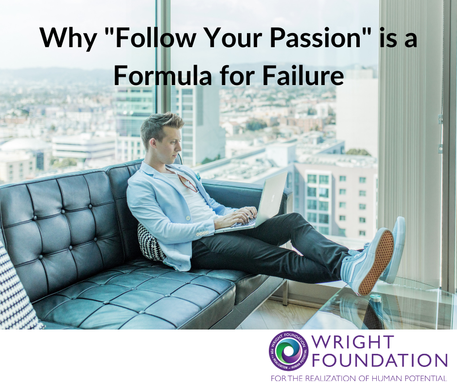 A young man sits on a couch in a corner office working on his laptop. The advice 'follow your passion' is a formula for failure. 